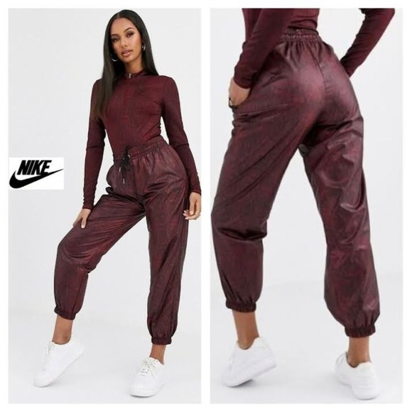 Nike Pants - NWT $85 NIKE Women S High Rise Woven Python Snake Print Joggers Pant Sportswear